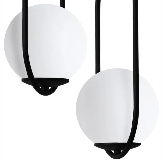 Pakabinamas lubinis šviestuvas Light Home LUNA, juodas, trigubas, su baltais sferiniais gaubtais virš stalo